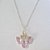 GARGANTILHA FOLHEADA A PRATA COM 50 MILÉSIMOS + VERNIZ DIAMOND CORRENTE 70CM PINGENTE COM ZIRCÔNIAS ROSA E AMARELA 32MM PRGG000618 - Imagem 1