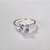 ANEL FOLHEADO A PRATA COM 50 MILÉSIMOS + VERNIZ DIAMOND COM MICRO ZIRCÔNIA 3MM E ZIRCÔNIA FORMATO CORAÇÃO 8MM LARGURA 1.5MM PRAN000017 - Imagem 2