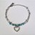 PULSEIRA EM AÇO INOXIDÁVEL 316L DUPLA CORAÇÃO VAZADO COM MICRO ZIRCÔNIAS E  PEDRAS AZUÍS 17CM + EXTENSOR FECHO LAGOSTA ACPS000347 - Imagem 1