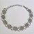 PULSEIRA EM AÇO INOXIDÁVEL 316L COM FLOR  16CM + EXTENSOR FECHO LAGOSTA ACPS000350 - Imagem 1