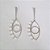 BRINCO FOLHEADO A PRATA COM 50 MILÉSIMOS + VERNIZ DIAMOND BASE LISA FINA COM PINGENTE OLHO GREGO 22MM PRBR000702 - Imagem 1
