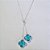GARGANTILHA FOLHEADA A PRATA COM 50 MILÉSIMOS + VERNIZ DIAMOND CORRENTE VENEZIANA GRAVATINHA 60CM TREVO AZUL 13MM PRGG000976 - Imagem 1