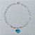 PULSEIRA FOLHEADA A PRATA COM 50 MILÉSIMOS + VERNIZ DIAMOND - PULSEIRA 18CM CORRENTE CORAÇÃO COM CORAÇÃO DE VIDRO AZUL 10MM -PRPS000754 - Imagem 1