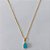 GARGANTILHA FOLHEADA A OURO CORRENTE CADEADO 42CM PINGENTE ZIRCÔNIA AZUL LEITOSO 7X10MM FECHO REDONDO OUGG000104 - Imagem 1