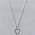GARGANTILHA FOLHEADA A PRATA COM 50 MILÉSIMOS + VERNIZ DIAMOND CORRENTE SINGAPURA 45CM PINGENTE CORAÇÃO VAZADO 14MM PRGG001138 - Imagem 1