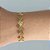 PULSEIRA (BRACELETE) EM AÇO INOXIDÁVEL DOURADA TREVOS LARGURA 10MM ACPS000473 - Imagem 1