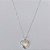 GARGANTILHA FOLHEADA A PRATA COM 50 MILÉSIMOS + VERNIZ DIAMOND CORRENTE VENEZIANA 45CM COM PINGENTE CORAÇÃO COM DETALHES VAZADOS CRAVEJADOS EM MICROS ZIRCÔNIAS 18MM + EXTENSOR FECHO LAGOSTA PRGG001176 - Imagem 1