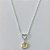 GARGANTILHA FOLHEADA A PRATA COM 50 MILÉSIMOS + VERNIZ DIAMOND CORRENTE SINGAPURA 45CM PINGENTE CORAÇÃO VAZADO E ZIRCÔNIA AMARELA REDONDA 10MM PRGG001296 - Imagem 1