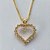 CONJUNTO FOLHEADO A OURO - BANHADO COM 5 MILÉSIMOS + VERNIZ DIAMOND - CONJUNTO COM CORRENTE VENEZIANA 45CM E PINGENTES CORAÇÃO VAZADO CRAVEJADO EM MICROS ZIRCÔNIAS 15x16MM - FECHO REDONDO - (OURO191) OUCJ000039 - Imagem 2