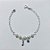 PULSEIRA FOLHEADA A PRATA COM 50 MILÉSIMOS + VERNIZ DIAMOND - PULSEIRA COM PÉROLAS OLHOS GREGOS E FIGA A- TAMANHO: 14CM - FECHO LAGOSTA PRPS001061 - Imagem 1