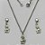CONJUNTO EM AÇO INOXIDÁVEL - GARGANTILHA 40CM E BRINCO DE PINO COM PINGENTE ANJINHO 7MM - COMPOSIÇÃO: AÇO INOXIDÁVEL - (AÇO1615) ACCJ000037 - Imagem 1