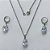 CONJUNTO EM AÇO INOXIDÁVEL - (AÇO03) CONJUNTO COM CORRENTE 50CM E BRINCOS ARGOLAS DE PRESSÃO COM PINGENTES EM ZIRCÔNIAS CRISTAIS 10X14MM - COMPOSIÇÃO: AÇO INOXIDÁVEL - (AÇO1636)ACCJ000038 - Imagem 1