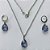 CONJUNTO EM AÇO INOXIDÁVEL - (AÇO03) CONJUNTO COM CORRENTE 50CM E BRINCOS ARGOLAS DE PRESSÃO COM PINGENTES EM ZIRCÔNIAS LILÁS 10X14MM - COMPOSIÇÃO: AÇO INOXIDÁVEL - (AÇO1637)ACCJ000039 - Imagem 1