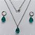 CONJUNTO EM AÇO INOXIDÁVEL - (AÇO03) CONJUNTO COM CORRENTE 50CM E BRINCOS ARGOLAS DE PRESSÃO COM PINGENTES EM ZIRCÔNIAS VERDES FUSION 10X14MM - COMPOSIÇÃO: AÇO INOXIDÁVEL - (AÇO1640)ACCJ000042 - Imagem 1