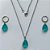 CONJUNTO EM AÇO INOXIDÁVEL - (AÇO03) CONJUNTO COM CORRENTE 50CM E BRINCOS ARGOLAS DE PRESSÃO COM PINGENTES EM RESINA VERDE 10X14MM - COMPOSIÇÃO: AÇO INOXIDÁVEL - (AÇO1650) ACCJ000051 - Imagem 1