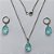 CONJUNTO EM AÇO INOXIDÁVEL - (AÇO03) CONJUNTO COM CORRENTE 50CM E BRINCOS ARGOLAS DE PRESSÃO COM PINGENTES EM RESINAS VERDES CLARAS 10X14MM - COMPOSIÇÃO: AÇO INOXIDÁVEL - (AÇO1653)ACCJ000054 - Imagem 1