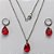CONJUNTO EM AÇO INOXIDÁVEL - (AÇO03) CONJUNTO COM CORRENTE 50CM E BRINCOS ARGOLAS DE PRESSÃO COM PINGENTES EM ZIRCÔNIAS VERMELHAS 10X14MM - COMPOSIÇÃO: AÇO INOXIDÁVEL - (AÇO1657) ACCJ000059 - Imagem 1