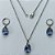CONJUNTO EM AÇO INOXIDÁVEL - (AÇO03) CONJUNTO COM CORRENTE 50CM E BRINCOS ARGOLAS DE PRESSÃO COM PINGENTES EM ZIRCÔNIAS LILÁS  10X14MM - COMPOSIÇÃO: AÇO INOXIDÁVEL - (AÇO1662) ACCJ000064 - Imagem 1