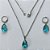 CONJUNTO EM AÇO INOXIDÁVEL - (AÇO03) CONJUNTO COM CORRENTE 50CM E BRINCOS ARGOLAS DE PRESSÃO COM PINGENTES EM ZIRCÔNIAS AZUÍS 10X14MM - COMPOSIÇÃO: AÇO INOXIDÁVEL - (AÇO1668) ACCJ000071 - Imagem 1