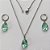 CONJUNTO EM AÇO INOXIDÁVEL - (AÇO03) CONJUNTO COM CORRENTE 50CM E BRINCOS ARGOLAS DE PRESSÃO COM PINGENTES EM ZIRCÔNIAS VERDES 10X14MM - COMPOSIÇÃO: AÇO INOXIDÁVEL - (AÇO1671)ACCJ000074 - Imagem 1