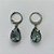 BRINCO EM AÇO INOXIDÁVEL - BRINCOS ARGOLAS DE PRESSÃO COM PINGENTES EM ZIRCÔNIAS CINZA 10X14MM - COMPOSIÇÃO: AÇO INOXIDÁVEL - (AÇO1680)ACBR000247 - Imagem 1