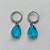 BRINCO EM AÇO INOXIDÁVEL - BRINCOS ARGOLAS DE PRESSÃO COM PINGENTES EM ZIRCÔNIAS AZUIS 10X14MM - COMPOSIÇÃO: AÇO INOXIDÁVEL - (AÇO1681)ACBR000248 - Imagem 1