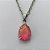 GARGANTILHA EM AÇO INOXIDÁVEL - (AÇO03) GARGANTILHA COM CORRENTE 50CM E PINGENTE EM RESINA ROSA COM BRILHOS 3X7MM - COMPOSIÇÃO: AÇO INOXIDÁVEL - (AÇO1796)ACGG000218 - Imagem 2