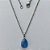 GARGANTILHA EM AÇO INOXIDÁVEL - (AÇO03) GARGANTILHA COM CORRENTE 50CM E PINGENTE EM RESINA AZUL COM BRILHOS 3X7MM - COMPOSIÇÃO: AÇO INOXIDÁVEL - (AÇO1824) ACGG000355 - Imagem 1