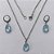 CONJUNTO EM AÇO INOXIDÁVEL - (AÇO03) GARGANTILHA COM CORRENTE 50CM E PINGENTE EM RESINA AZUL CLARO 3X7MM - COMPOSIÇÃO: AÇO INOXIDÁVEL - (AÇO1826) ACCJ000089 - Imagem 1