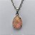 CONJUNTO EM AÇO INOXIDÁVEL - (AÇO03) GARGANTILHA COM CORRENTE 50CM E PINGENTE EM RESINA SALMÃO COM BRILHOS 3X7MM - COMPOSIÇÃO: AÇO INOXIDÁVEL - (AÇO1839) ACCJ000094 ACCJ000094 - Imagem 2
