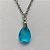 GARGANTILHA EM AÇO INOXIDÁVEL - (AÇO03) GARGANTILHA COM CORRENTE 50CM E PINGENTE EM ZIRCÔNIA AZUL 10X14MM - COMPOSIÇÃO: AÇO INOXIDÁVEL / ZIRCÔNIA - (AÇO1907) ACGG000341 - Imagem 2