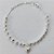 PULSEIRA FOLHEADA A PRATA COM 50 MILÉSIMOS + VERNIZ DIAMOND - PULSEIRA COM BOLINHAS E CORAÇÃO DESENHADO - TAMANHO: 17CM E  FECHO LAGOSTA (PRA404) PRPS001156 - Imagem 1