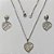 CONJUNTO EM AÇO INOXIDÁVEL - CORRENTE 50CM (AÇO03) BRINCO DE PINO COM BASE GOTA E PINGENTE CORAÇÕES DETALHES VAZADOS 19MM - COMPOSIÇÃO: AÇO INOXIDÁVEL - (AÇO2005) ACCJ000106 - Imagem 1