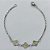 PULSEIRA EM AÇO INOXIDÁVEL - (ACO1012) - PULSEIRA COM 3 TREVO 7MM - TAMANHO 18CM - FECHO LAGOSTA - COMPOSIÇÃO: AÇO INOXIDÁVEL - (AÇO2037)) ACPS000704 - Imagem 1