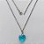 GARGANTILHA EM AÇO INOXIDAVEL - (AÇO03) GARGANTILHA COM CORRENTE 50CM E PINGENTE CORAÇÃO CRISTAL AZUL 13MM - FECHO LAGOSTA (AÇO2046) ACGG000446 - Imagem 1