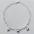 PULSEIRA FOLHEADA A PRATA COM 50 MILÉSIMOS + VERNIZ DIAMOND - PULSEIRA CORRENTE CORAÇÃO COM PÉROLAS E CORAÇÃO LISO - TAMANHO: 19CM E  FECHO LAGOSTA (PRA483) PRPS001166 - Imagem 1