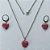 CONJUNTO EM AÇO INOXIDÁVEL - (AÇO03) CONJUNTO COM CORRENTE 50CM E BRINCOS ARGOLINHA DE PRESSÃO COM PINGENTES CORAÇÃO EM CRISTAL COM GLITTER ROSA 12MM - COMPOSIÇÃO: AÇO INOXIDÁVEL - (AÇO2087) ACCJ000110 - Imagem 1