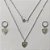 CONJUNTO EM AÇO INOXIDÁVEL - (AÇO03C) - CONJUNTO COM CORRENTE 50CM E BRINCOS ARGOLINHA DE PRESSÃO COM PINGENTES NOSSA SENHORA APARECIDA FORMATO CORAÇÃO 10MM - COMPOSIÇÃO: AÇO INOXIDÁVEL - (AÇO2111) ACCJ000114 - Imagem 1