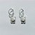 BRINCO FOLHEADA A PRATA COM 50 MILÉSIMOS + VERNIZ DIAMOND - BRINCO DE ARGOLA DE PRESSÃO COM PINGENTE GATINHO 8MM PRBR001303 - Imagem 1
