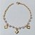 PULSEIRA FOLHEADA A OURO + VERNIZ - PULSEIRA 18CM COM PÉROLAS E CORAÇÕES VAZADOS(OURO1197) OUPS0000121 - Imagem 1