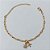 PULSEIRA FOLHEADO A OURO + VERNIZ - PULSEIRA 15CM COM FLOR DE MICRO ZIRCÔNIAS E AVIÃO- (OURO1179) OUPS0000125 - Imagem 1