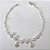 PULSEIRA FOLHEADA A PRATA COM 50 MILÉSIMOS + VERNIZ DIAMOND - PULSEIRA COM PÉROLAS E PINGENTES EM MICROS ZIRCÔNIAS - TAMANHO: 21CM E FECHO LAGOSTA - PRPS001252 - Imagem 1