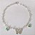 PULSEIRA FOLHEADA A PRATA COM 50 MILÉSIMOS + VERNIZ DIAMOND - PULSEIRA COM BORBOLETAS EM CRISTAIS VERDES PEQUENAS E PINGENTE EM BORBOLETA - TAMANHO: 20CM E FECHO LAGOSTA - PRPS001259 - Imagem 1