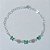 PULSEIRA FOLHEADA A PRATA COM 50 MILÉSIMOS + VERNIZ DIAMOND - PULSEIRA 19CM CORRENTE CORAÇÃO COM BORBOLETAS VERDES DE VIDRO E FECHO LAGOSTA - PRPS001273 - Imagem 1