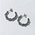 BRINCO EM AÇO INOXIDÁVEL - BRINCO ARGOLA ENTRELAÇADA 4,5X24MM (ARGI0426) - COMPOSIÇÃO: AÇO INOXIDÁVEL - (AÇO2244)- ACBR000500 - Imagem 2