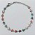 PULSEIRA EM AÇO INOXIDÁVEL - PULSEIRA 15CM COM MARGARIDAS COLORIDAS + EXTENSOR E FECHO LAGOSTA - ACPS000772 - Imagem 1