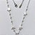 O GARGANTILHA EM AÇO INOXIDÁVEL - GARGANTILHA 40CM COM ESTRELAS E BOLAS EM PÉROLAS + EXTENSOR - ACGG000586 - Imagem 1