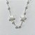 O GARGANTILHA EM AÇO INOXIDÁVEL - GARGANTILHA 40CM COM ESTRELAS E BOLAS EM PÉROLAS + EXTENSOR - ACGG000586 - Imagem 2