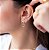 Brinco Feminino Oval banhado a ouro amarelo com zirconias brancas. - Imagem 1