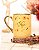 Caneca nobelle gold amarela personalizada  mãe e avó flor #2 300mL - Imagem 2